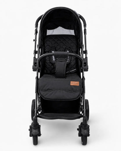 Poussette valise réversible noire pour bébé de la marque Kidlo, compacte et pratique pour les déplacements quotidiens.