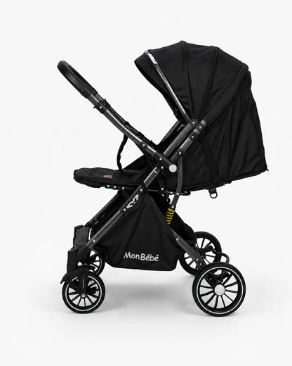 Poussette valise réversible noire pour bébé de la marque Kidlo, pliable et pratique pour les promenades.