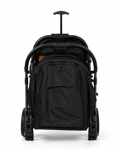 Poussette valise réversible noire pour bébé de la marque Kidlo, compacte et pratique, idéale pour les voyages et balades.