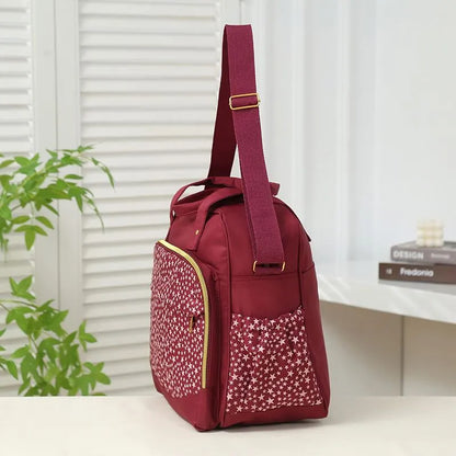 Sac à langer bébé KIDLO 3 pièces avec compartiments pratiques, en tissu durable, idéal pour les sorties avec bébé.