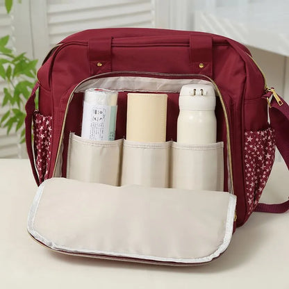Sac à langer bébé KIDLO, ensemble de 3 pièces avec poches et bandoulière, parfait pour les sorties avec bébé.